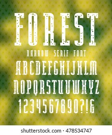 Narrow serif font with speckled texture. White print on blurred background