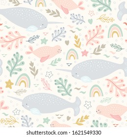 Narwhal pattern. Vector sea life seamless repeat design with rainbows.