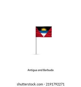 National flag of Antigua and Barbuda on a gray pole.