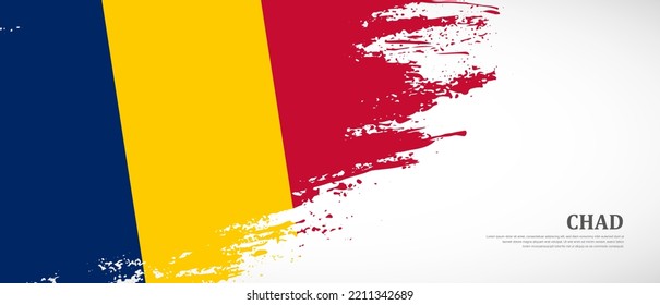 National flag of Chad with textured brush flag. Artistic hand drawn brush flag banner background