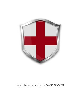 The national flag of England. Metal shield with reflections on a white background.