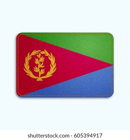 National flag of Eritrea with denim texture and orange seam. Realistic image of a tissue made in vector illustration.