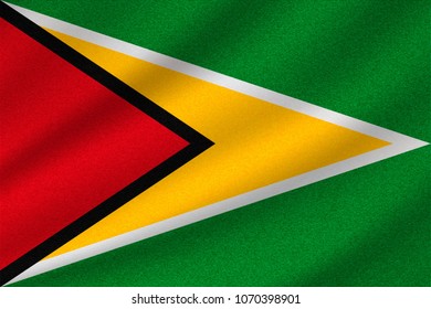 national flag of Guyana on wavy cotton fabric. Realistic vector illustration.
