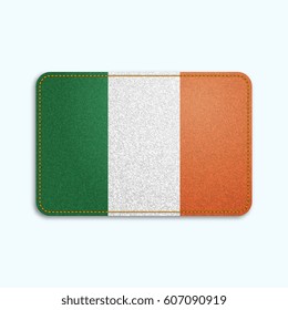 National flag of Ireland with denim texture and orange seam. Realistic image of a tissue made in vector illustration.