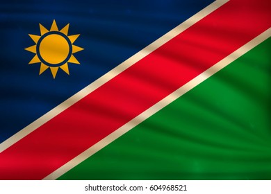 The national flag of Namibia on wavy silk background with bokeh lights. Realistic vector illustration.