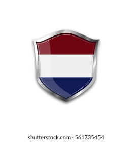 The national flag of Netherlands. Metal shield with reflections on a white background.