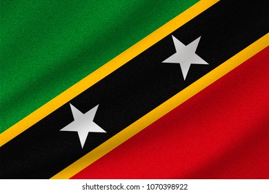 national flag of Saint Kitts and Nevis on wavy cotton fabric. Realistic vector illustration.
