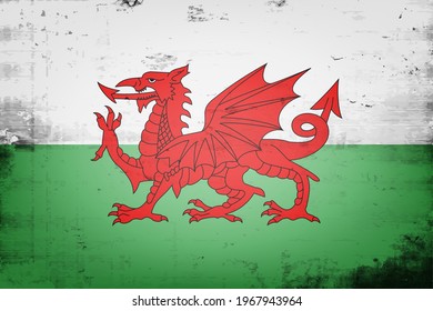 National flag of Wales. Vintage background. Grunge texture. Banner design pattern. Vector illustration