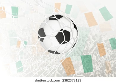 National Football team of Ivory Coast scored goal. Ball in goal net, while football supporters are waving the Ivory Coast flag in the background. Vector illustration.