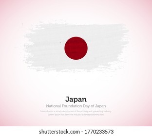 National foundation day of Japan country. Abstract flag in shape of paint brush stroke with shiny colored background