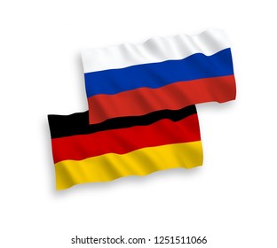 National vector fabric wave flags of Germany and Russia isolated on white background.