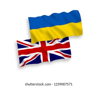 National vector fabric wave flags of Ukraine and Great Britain isolated on white background.