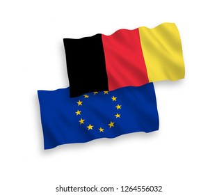 National vector fabric wave flags of Belgium and European Union isolated on white background.
