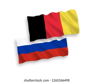 National vector fabric wave flags of Russia and Belgium isolated on white background.