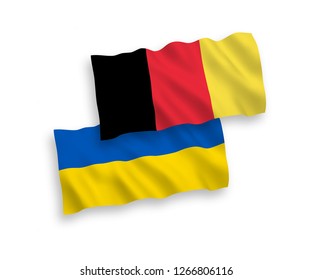National vector fabric wave flags of Belgium and Ukraine isolated on white background.