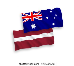 National vector fabric wave flags of Australia and Latvia isolated on white background.