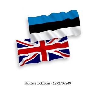National vector fabric wave flags of Estonia and Great Britain isolated on white background.