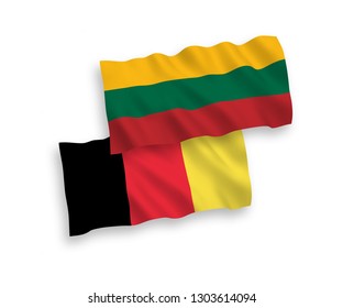 National vector fabric wave flags of Lithuania and Belgium isolated on white background. 1 to 2 proportion.