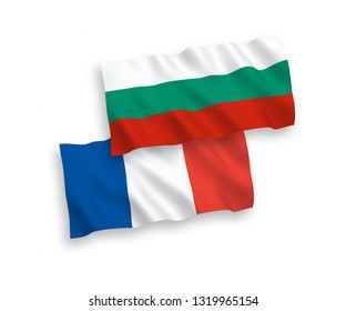 National vector fabric wave flags of France and Bulgaria isolated on white background. 1 to 2 proportion.