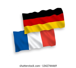 National vector fabric wave flags of France and Germany isolated on white background. 1 to 2 proportion.