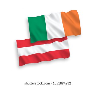 National vector fabric wave flags of Austria and Ireland isolated on white background. 1 to 2 proportion.