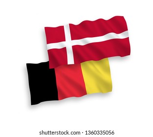 National vector fabric wave flags of Belgium and Denmark isolated on white background. 1 to 2 proportion.
