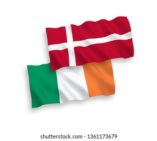 National vector fabric wave flags of Ireland and Denmark isolated on white background. 1 to 2 proportion.