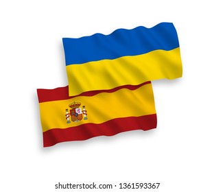 National vector fabric wave flags of Spain and Ukraine isolated on white background. 1 to 2 proportion.