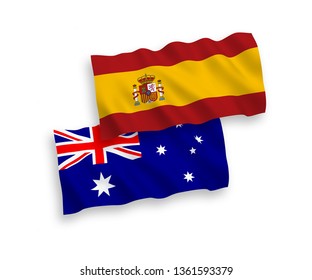 National vector fabric wave flags of Australia and Spain isolated on white background. 1 to 2 proportion.