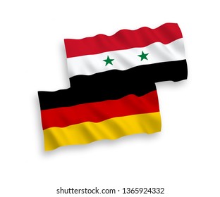 National Vector Fabric Wave Flags Of Germany And Syria Isolated On White Background. 1 to 2 proportion.