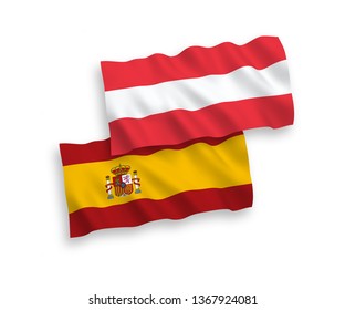 National vector fabric wave flags of Austria and Spain isolated on white background. 1 to 2 proportion.