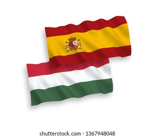 National vector fabric wave flags of Spain and Hungary isolated on white background. 1 to 2 proportion.