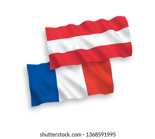 National vector fabric wave flags of France and Austria isolated on white background. 1 to 2 proportion.