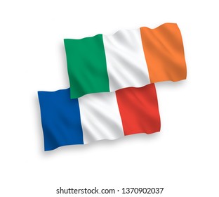 National vector fabric wave flags of France and Ireland isolated on white background. 1 to 2 proportion.