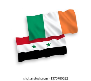 National vector fabric wave flags of Ireland and Syria isolated on white background. 1 to 2 proportion.