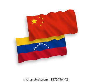 National vector fabric wave flags of Venezuela and China isolated on white background 1 to 2 proportion.