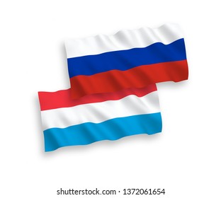 National vector fabric wave flags of Luxembourg and Russia isolated on white background. 1 to 2 proportion.