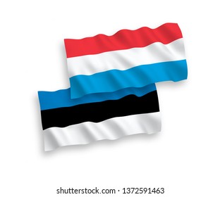 National vector fabric wave flags of Estonia and Luxembourg isolated on white background. 1 to 2 proportion.
