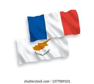 National vector fabric wave flags of France and Cyprus isolated on white background. 1 to 2 proportion.