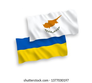 National vector fabric wave flags of Cyprus and Ukraine isolated on white background. 1 to 2 proportion.