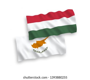 National vector fabric wave flags of Cyprus and Hungary isolated on white background. 1 to 2 proportion.