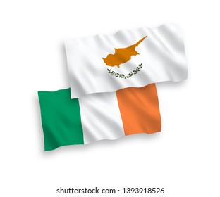 National vector fabric wave flags of Ireland and Cyprus isolated on white background. 1 to 2 proportion.