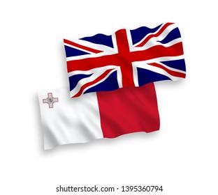 National vector fabric wave flags of Great Britain and Malta isolated on white background. 1 to 2 proportion.