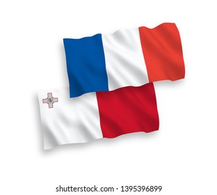National vector fabric wave flags of France and Malta isolated on white background. 1 to 2 proportion.