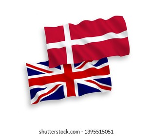 National vector fabric wave flags of Great Britain and Denmark isolated on white background. 1 to 2 proportion.