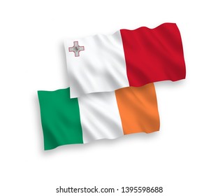 National vector fabric wave flags of Ireland and Malta isolated on white background. 1 to 2 proportion.