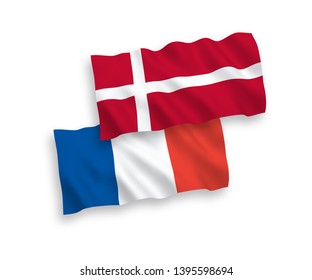 National vector fabric wave flags of France and Denmark isolated on white background. 1 to 2 proportion.