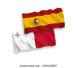 National vector fabric wave flags of Malta and Spain isolated on white background. 1 to 2 proportion.