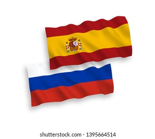 National vector fabric wave flags of Spain and Russia isolated on white background. 1 to 2 proportion.