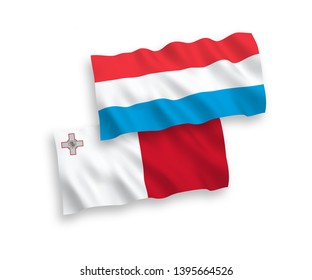 National vector fabric wave flags of Malta and Luxembourg isolated on white background. 1 to 2 proportion.